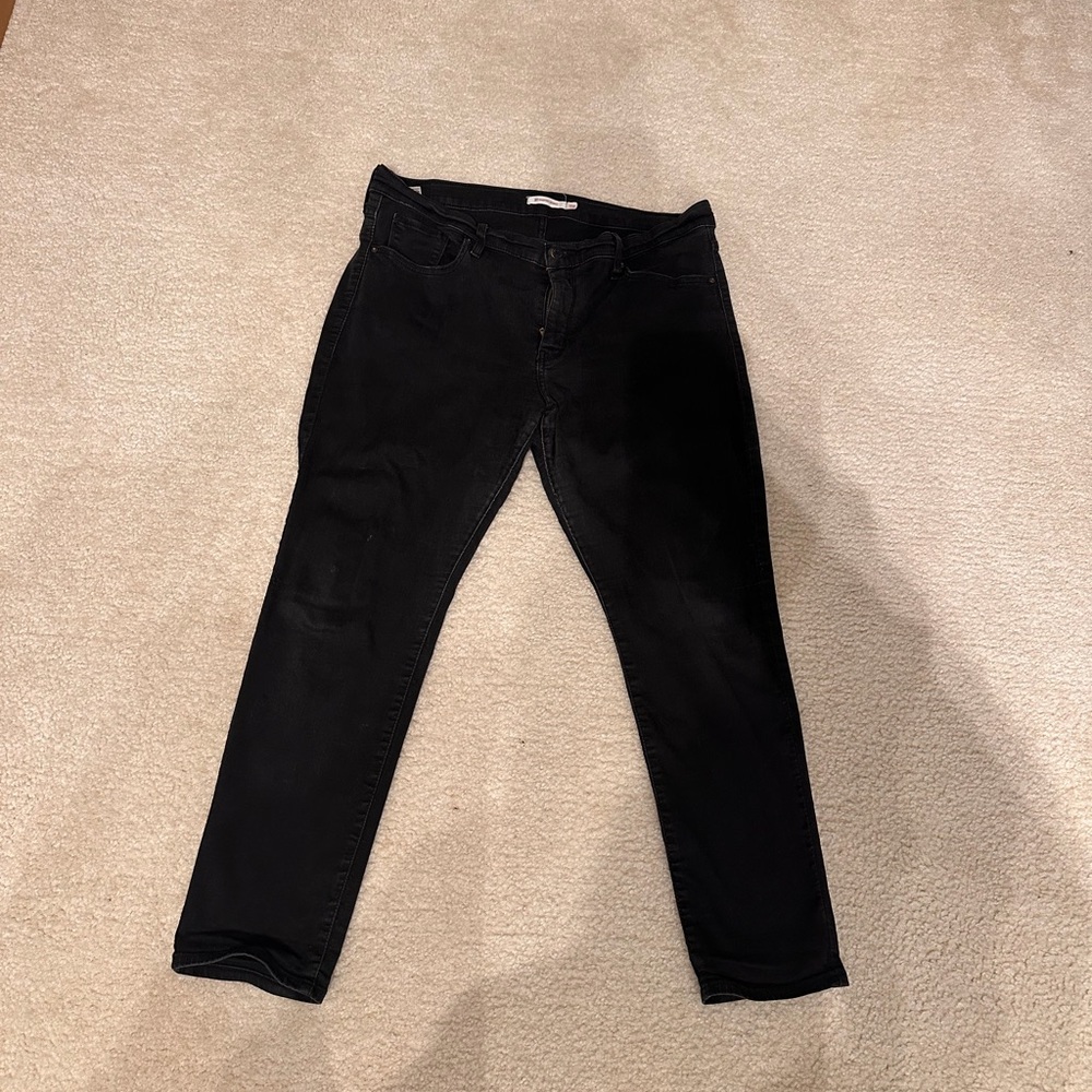 Levi's 311 Black Denim Skinny Jeans with Subtle Fading
